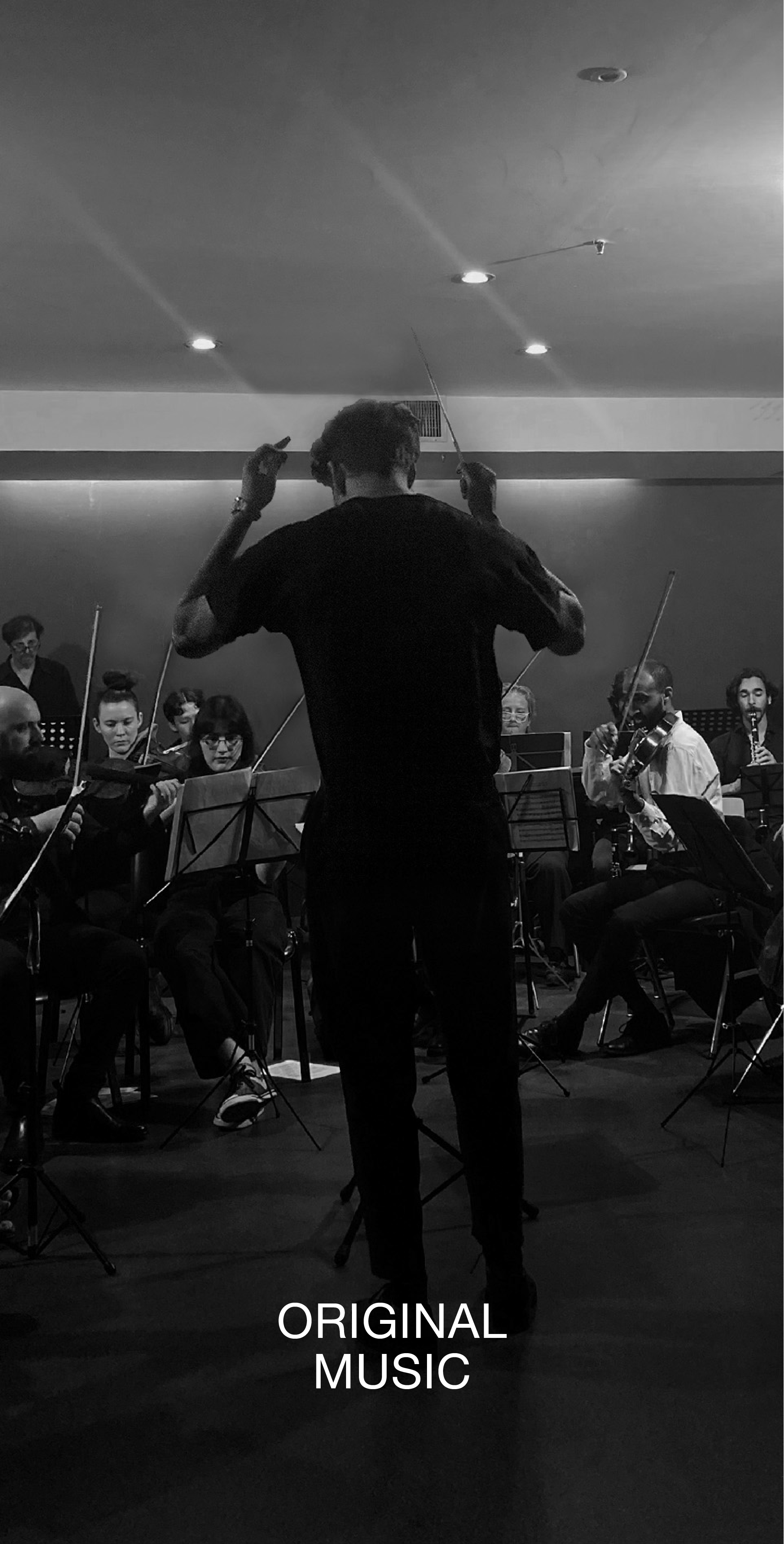 Foto Nicolás dirigiendo una orquesta